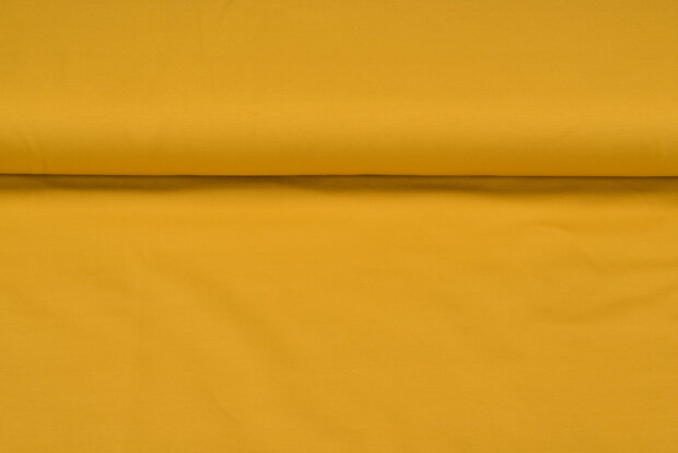 Baumwolljersey uni ockergelb