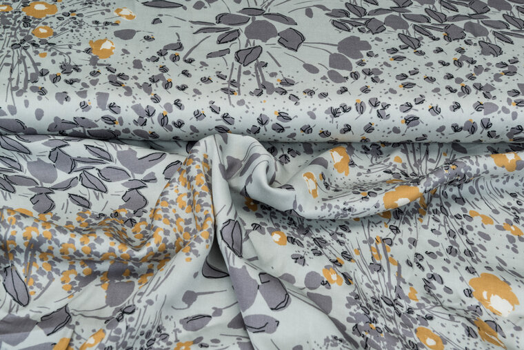 Viscose bedruckt flower grijs-oker