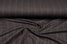 Strickstoff mit Zopfmuster braun