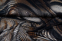 Baumwolljersey bedruckt retro scales schwarz-braun