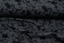 Strickstoff Jacquard leaves grau-schwarz